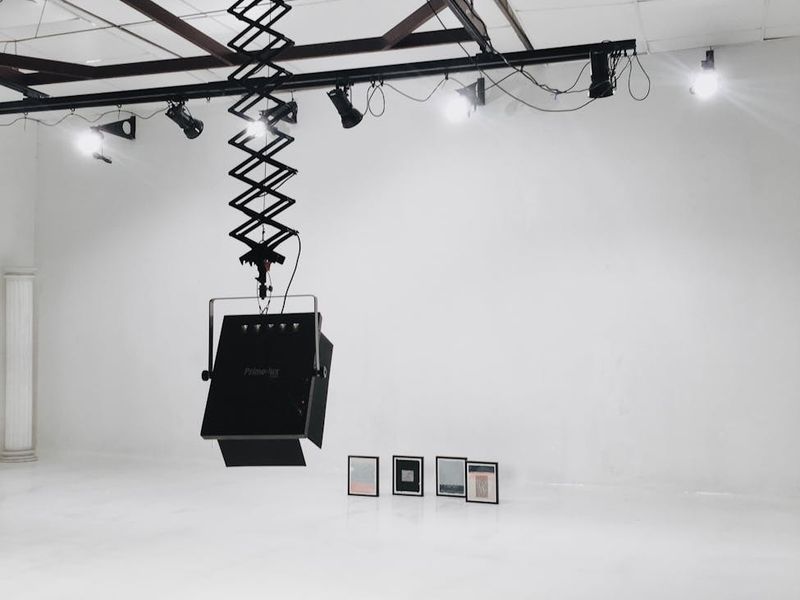 Large wide shot of a minimalist fitness studio space